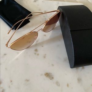 PRADA aviator style sunglasses.